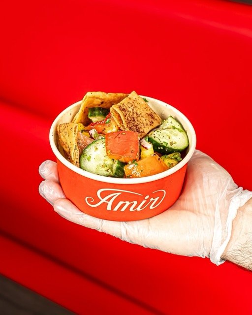 Amir food photography showing a side of hummus.